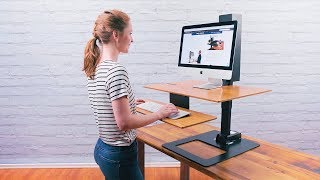 The E7 Electric Standing Desk Converter by UPLIFT Desk [upl. by Llerryt]