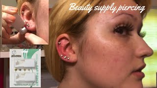 Piercing my ear with a disposable gun How to do your own piercings [upl. by Zampino]