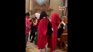 Los Angeles prochoice protesters try to shut down Communion in cathedral [upl. by Adiuqram521]