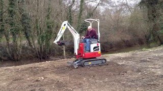 First Try Of The New Takeuchi TB210R Mini Excavator [upl. by Nevaed]