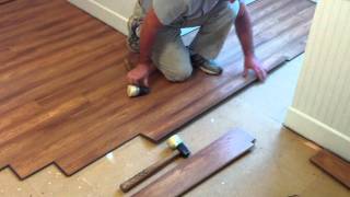 How to install Pergo laminate flooring [upl. by Ecnarepmet385]