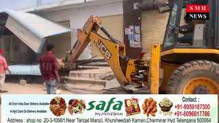 Ghmc town planning officials demolishing the buildings standing on the footpaths in Rajendranagar [upl. by Miun]