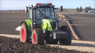 Claas Arion 640 tractor with Ovlac 5 furrow reversible plough  Grampian Supermatch [upl. by Gatian]