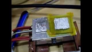 Ultrasonically Soldering Aluminum plate and Glass [upl. by Neirrad646]