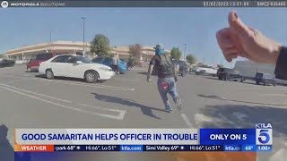 Good samaritan helps officer in trouble [upl. by Nehgaem]