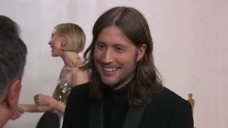 Ludwig Goransson talks about composing quotOppenheimerquot score on Oscars red carpet [upl. by Tullus379]