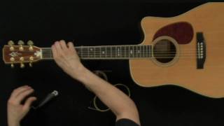 How To Change Acoustic Guitar Strings  Guitar Lessons [upl. by Uwkuhceki436]