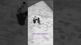 quotPossessed Woman Scales Building While Holding Victim by Hair – Shocking Footagequot shorts [upl. by Leilamag405]