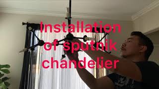 Installation of sputnik chandelier [upl. by Delanty694]