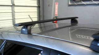 Mazda Mazda3 with Thule 460R Podium AeroBlade Roof Rack by Rack Outfitters [upl. by Genvieve]