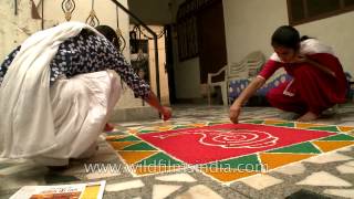 Indian girls prepare colourful rangoli for Diwali in Fatehpur Beri village [upl. by Nilyarg]