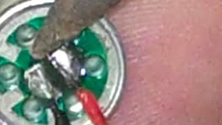 Soldering wires to the terminals of the electret microphone [upl. by Bartle]