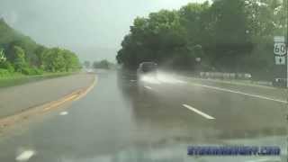 HD dashcam hydroplaning and bumping the center divider [upl. by Debo]