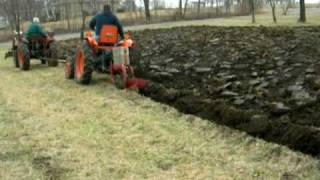 48 Horsepower 8 Wheel Drive Kubota Pulling A Ferguson 2 Bottom Plow [upl. by Hgielime]