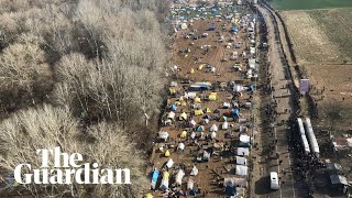 Aerial footage shows queues of migrants near GreekTurkish border [upl. by Maximilien]