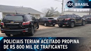 Policiais acusados de aceitar dinheiro de traficantes são alvos de operação  SBT Brasil 030924 [upl. by Wakefield]