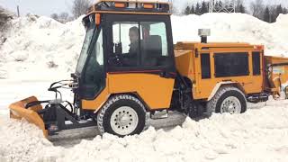 Trackless Articulating Sidewalk Tractor with 5Position Folding VPlow [upl. by Ferren]