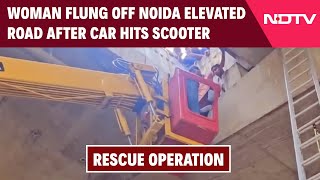 Noida News  Woman Flung Off Noida Elevated Road After Car Hits Scooter Lands On Pillar [upl. by Salena238]