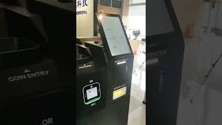 A selfservice kiosk that can both collect money and give change [upl. by Ocisnarf]