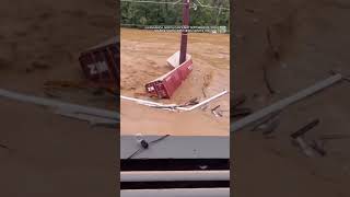 New video from NC shows powerful flood water tearing building in half [upl. by Ahsinrad49]