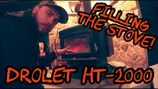 63 Filling the Wood Stove With Firewood Drolet HT2000 [upl. by Yregerg618]