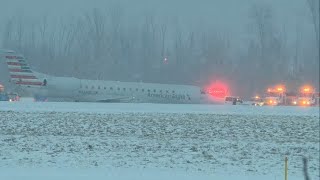 Plane out of Philadelphia International Airport slides off taxiway in Rochester New York [upl. by Braasch]