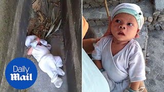 Baby boy rescued after being abandoned between tombs in graveyard [upl. by Annoirb]