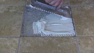 LATICRETE Pro Tips How to Remove and Replace a Chipped or Broken Tile [upl. by Ahsieki]