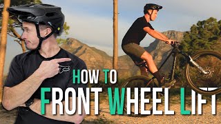 How to lift your front wheel on your Mountain Bike GET IT UP [upl. by Cathi602]