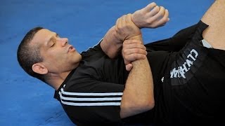 How to Do a Traditional Kimura from Guard  MMA Submissions [upl. by Nrubloc]