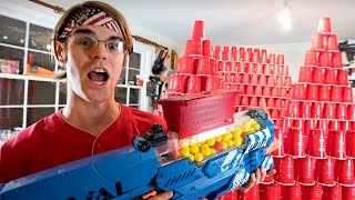 Worlds Greatest Nerf Gun VS OVER 1001 Cups Ft Aaron Esser [upl. by Curkell]