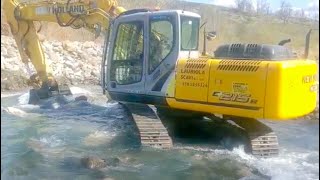 NEW HOLLAND E215b  deviazione flusso [upl. by Samalla235]